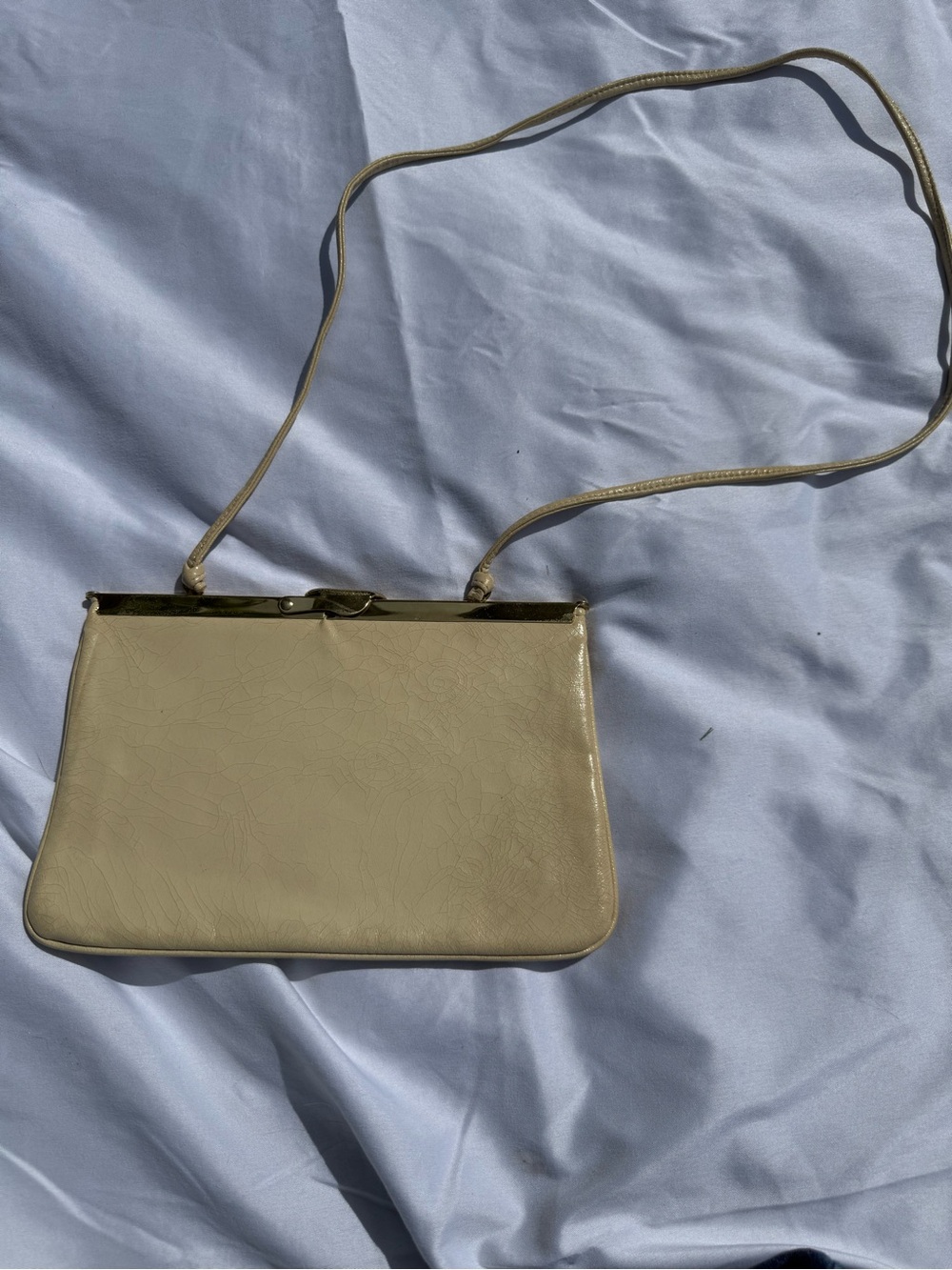 Elegant Cream Shoulder Bag with Gold Trim